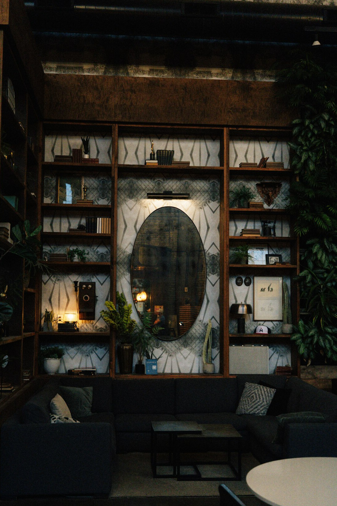 Bookshelf filled with books in a cozy reading room